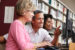 One-on-One Computer, Tablet & Smart Phone Skills Help Seniors working on computers in library